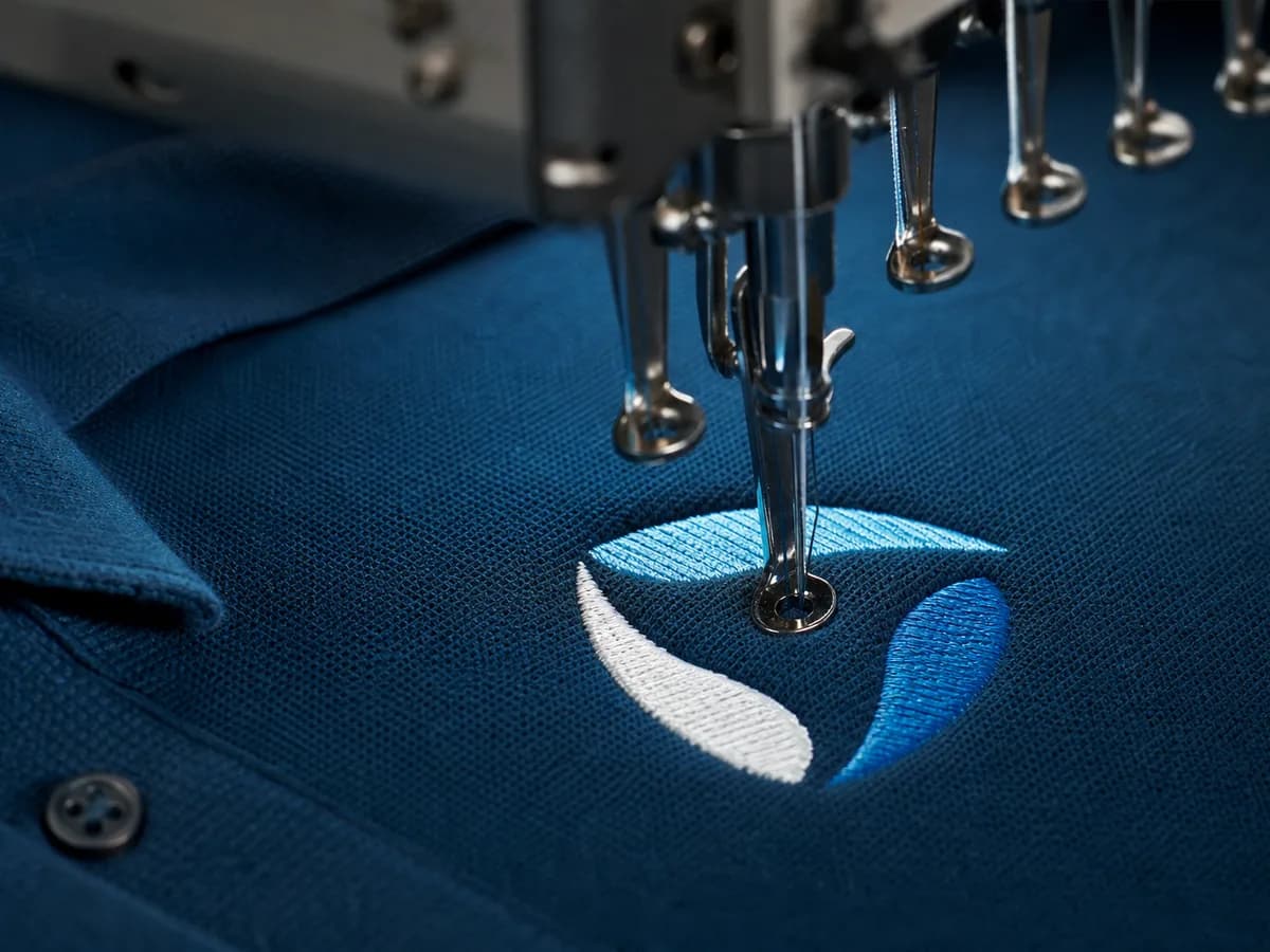 Embroidered polo shirts and workwear for Cambridge staff uniforms